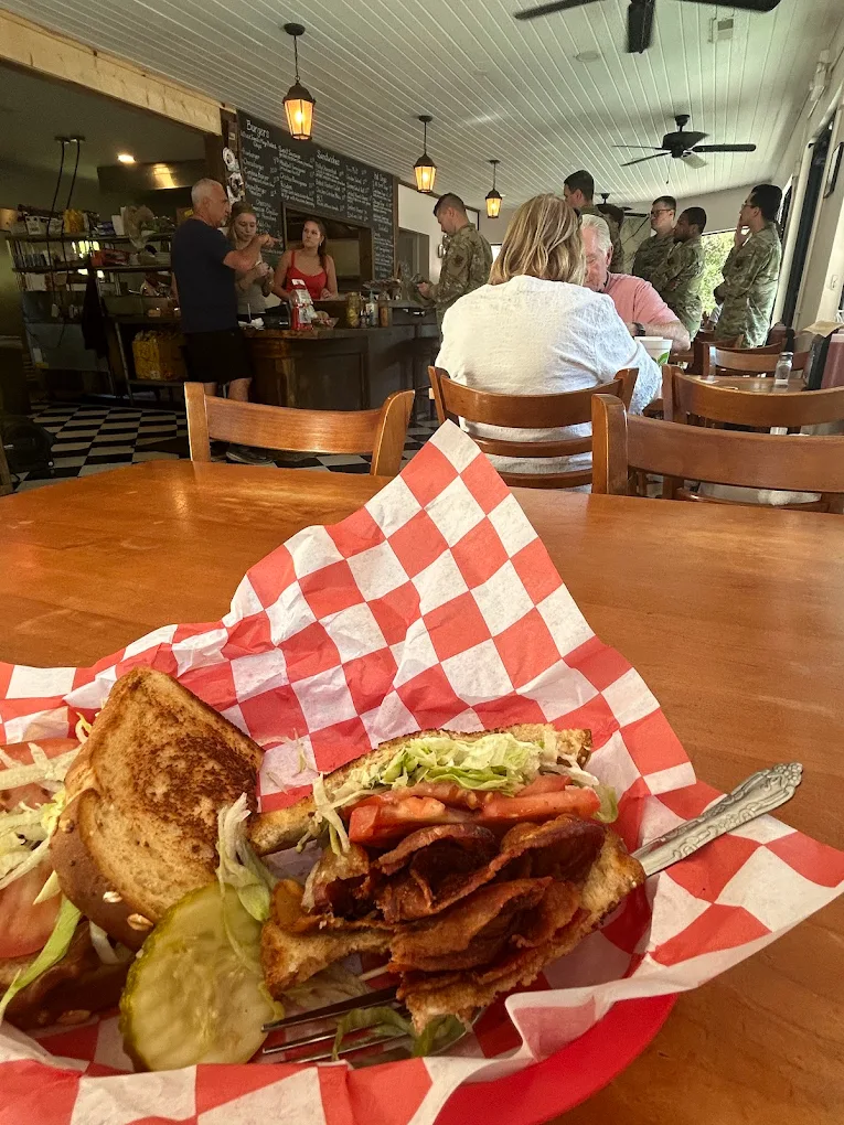 BLT sandwich served in the dining room of Centreville Luncheonette with customers visible in the background